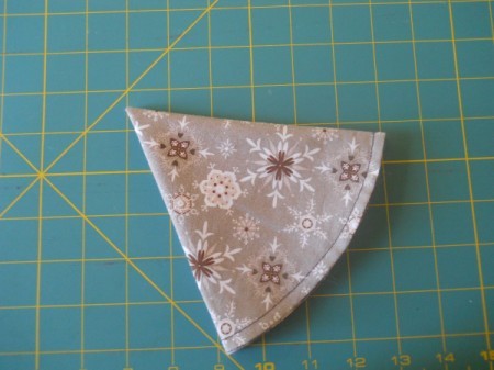 Half circle folded into thirds.