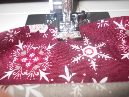 Sewing the 2.25 inch lines through layer two and three.