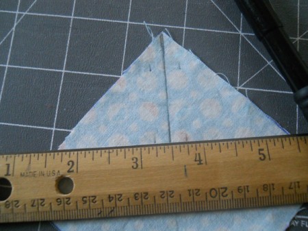 Marking fabric to draw sewing lines.