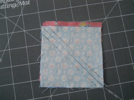 Squares with right sides together and marked side up.