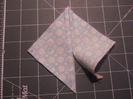 Cutting apart along dividing line.