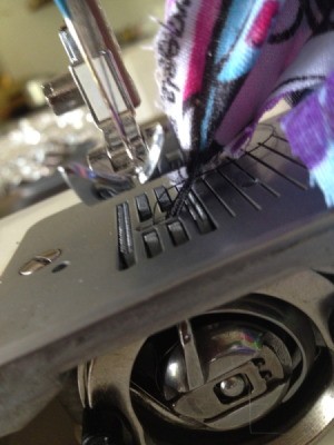 Tangled thread and bobbin case.