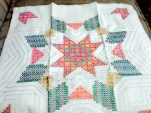 WonderArt star motif quilt block.