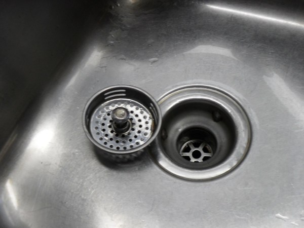 cleaning stainless steel sink grids