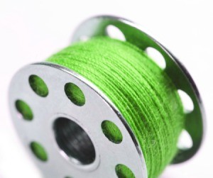 Bobbin with Green Thread