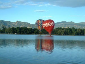 hot air balloons on water