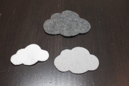 three felt clouds