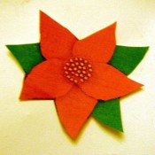 A completed poinsettia pin.
