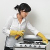 Woman Cleaning Appliances