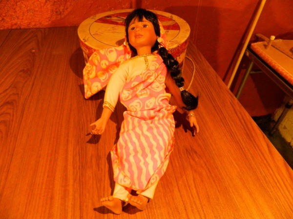 Doll with long skirt and braid.