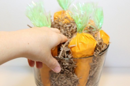 tuck shredded paper around carrots