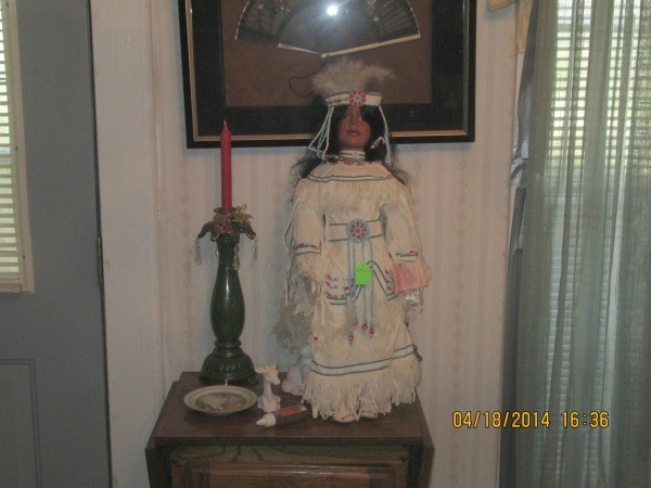 Female doll in light dress.