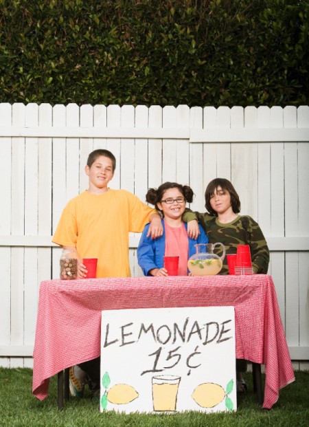 Kids selling lemonade.