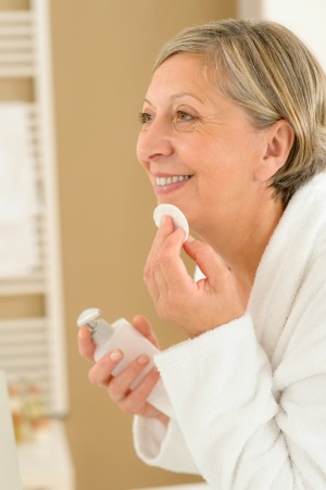 A woman caring for her skin.