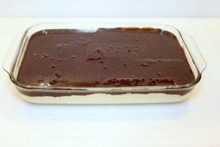 pour frosting onto cake