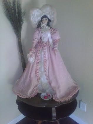 doll in long pink dress