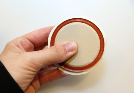 use lid to trim spout