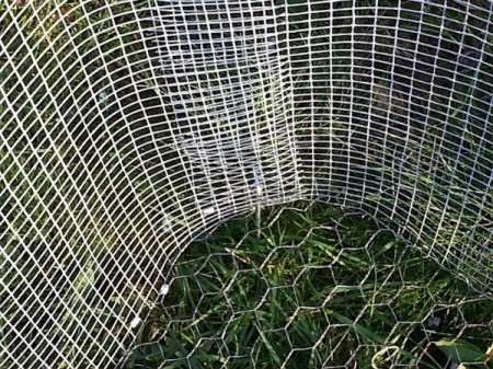 view of cage with attached chicken wire bottom