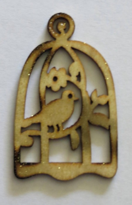 vintage treatment on bird cage embellishment