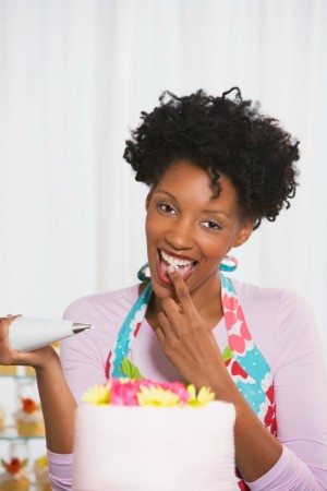 Woman Enjoying Cake Decorating