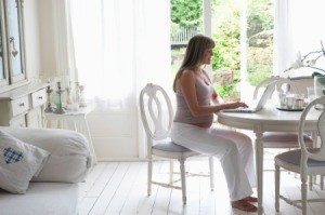 Pregnant Woman Working from Home