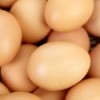 A pile of brown chicken eggs.