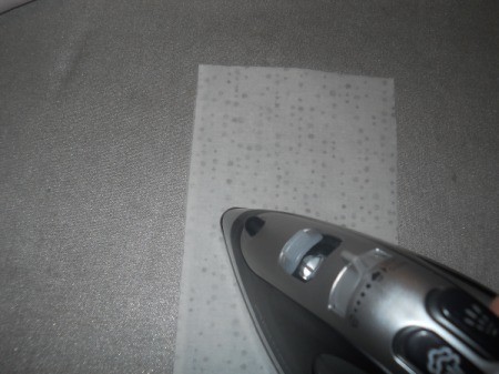 ironing fusible webbing onto fabric