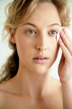 Woman Applying Facial Concealer