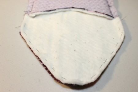 baste lining to flap