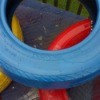 blue, red, and yellow stacked tires