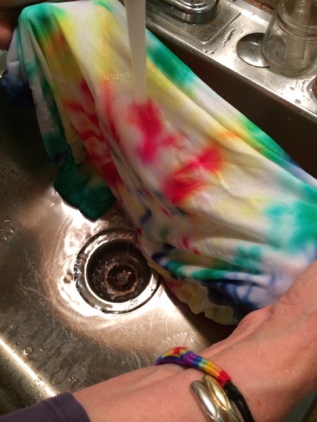 rinse shirt until water runs clear