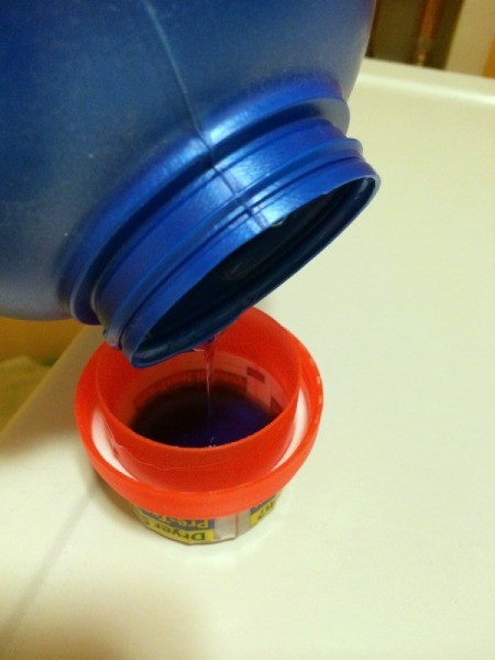 pouring out last of clorox 2