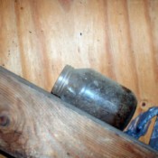 glass jar on shed framework