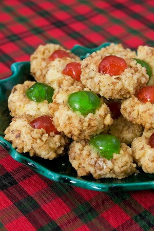 plate of cherry topped cookies