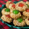 plate of cherry topped cookies