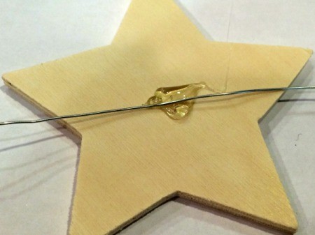 hot glue wire to back of star