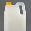 transparent container of liquid laundry detergent