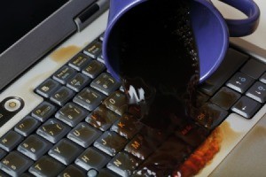 dark liquid spilled on laptop keyboard