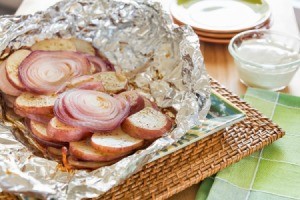 grilled potatoes and onions in foil package