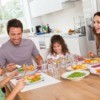 Family Eating Together Using Placemats