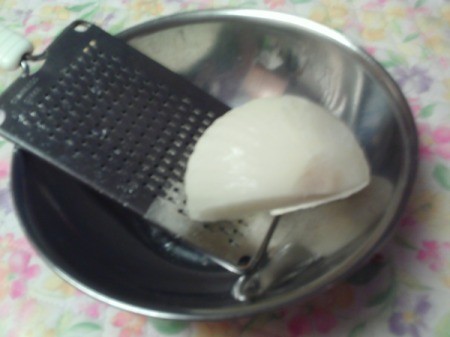 A grater in a bowl