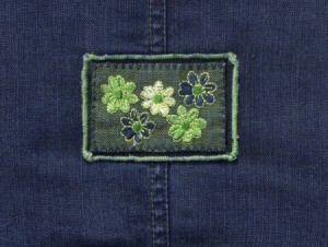 stitched flowers on jeans patch