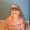 doll in long peach colored dress