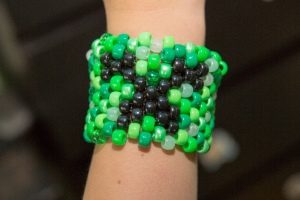 Beaded Minecraft Creeper Cuff - finished bracelet being worn