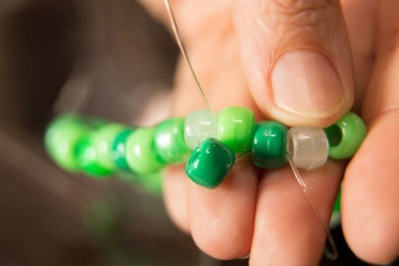 Beaded Minecraft Creeper Cuff - close up of beading the bracelet