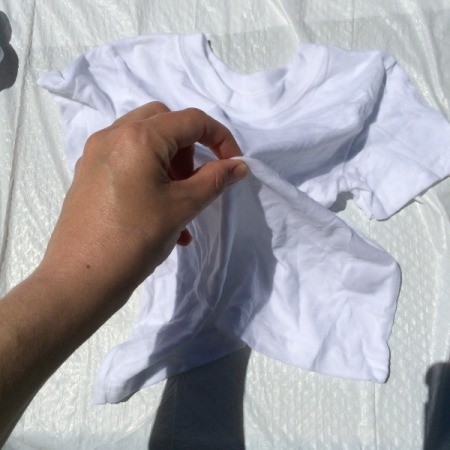 grab center of shirt