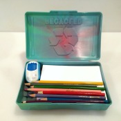 green plastic box with drawing supplies