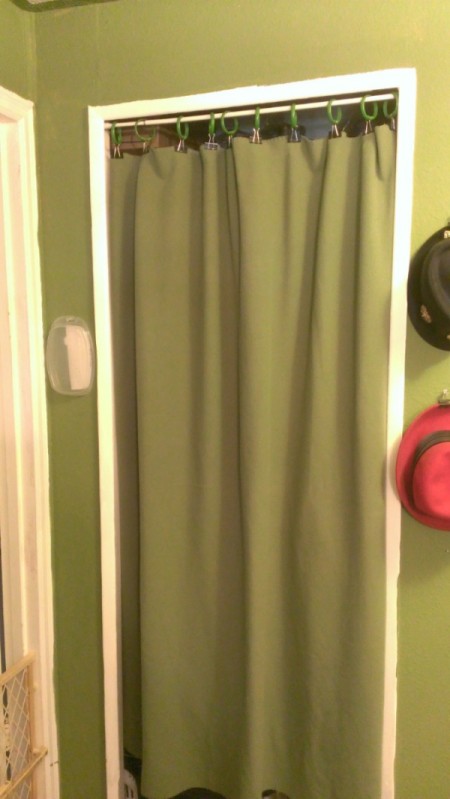 Blanket Curtain in a doorway hung with binder clips and shower curtain rings Without Sewing