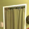 Blanket Curtain in a doorway hung with binder clips and shower curtain rings Without Sewing