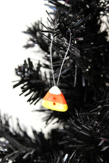 candy corn ornament on tree